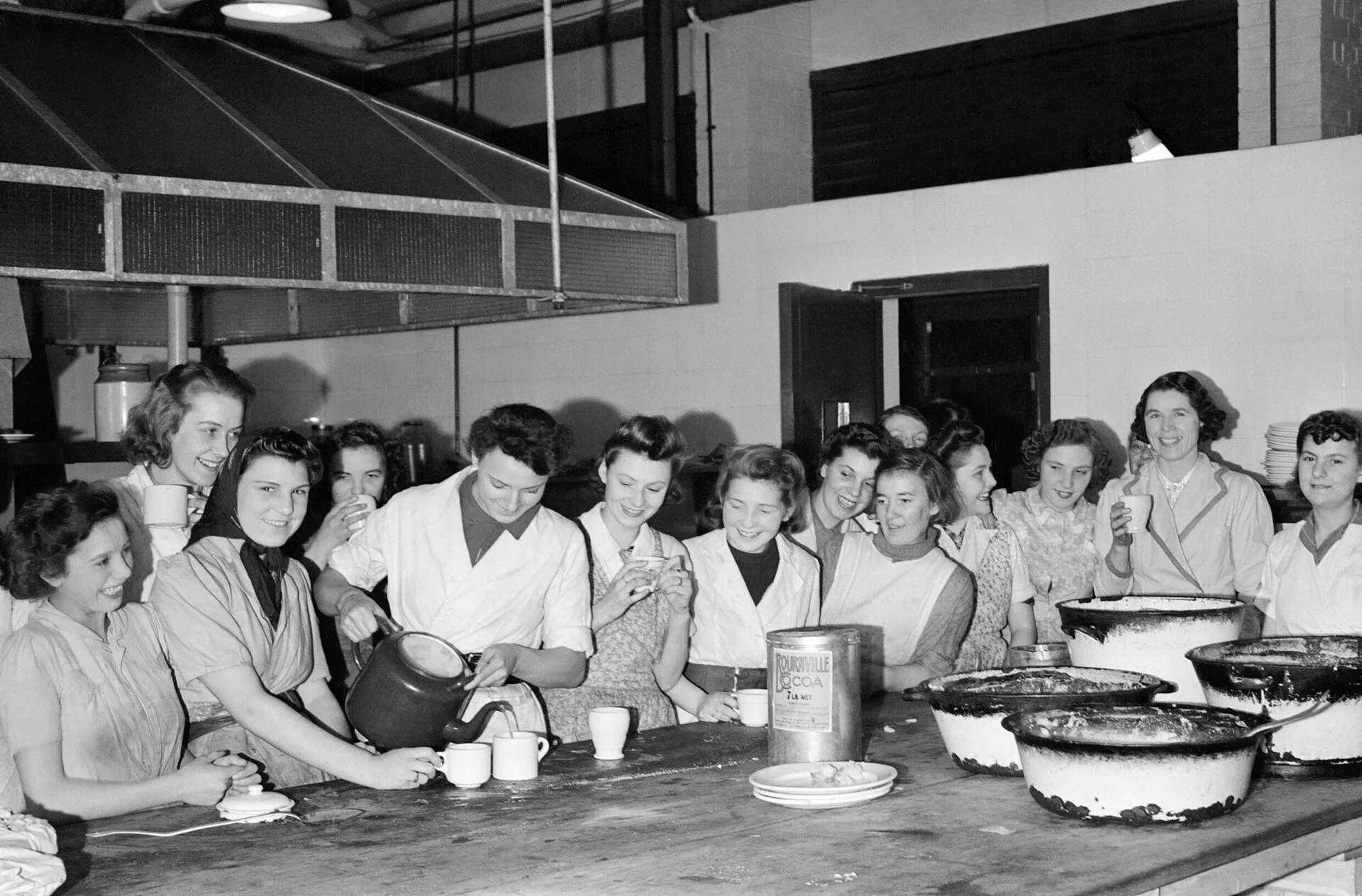 Catering staff have a quick cup of tea before the dinner-time rush begins at a canteen in an British aircraft factory, 1942. Female buffet workers have a quick cup of tea before the dinner-time rush begins at this works canteen in an aircraft factory, somewhere in Britain. Banquet Staff Wage Rates Ontario: Real Numbers for Caterers